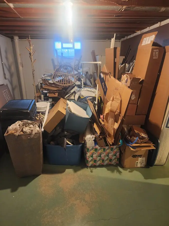 Roll-off dumpster container at job site for 4 Yard Dumpster Rental in Jamestown